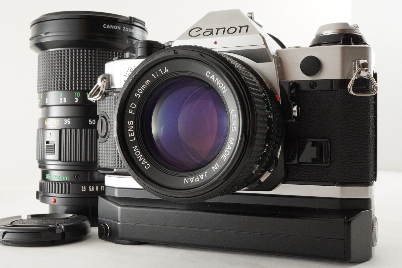 Canon AE-1 PROGRAM +POWER WINDER A2 + NEW FD 50mm 1.4 +35-105mm 