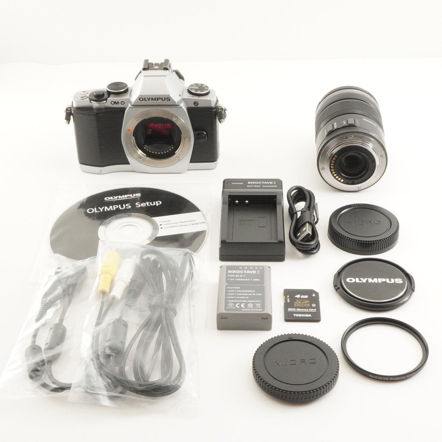 [7,861 Shots] OLYMPUS OM-D E-M5 Silver +12-50mm +4GB SDHC Card from Japan #10902