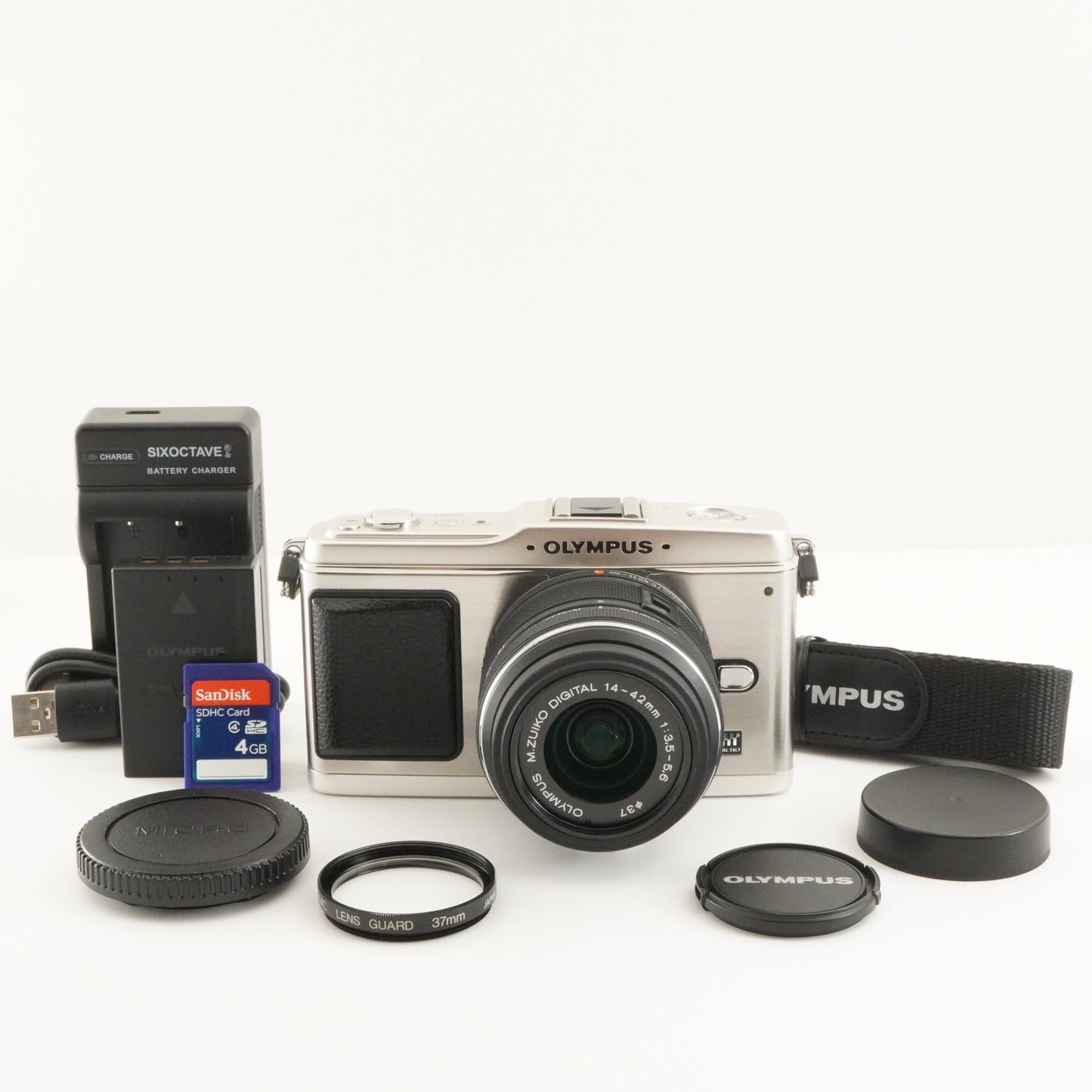 [3,863 Shots] OLYMPUS PEN E-P1 Silver + 14-42mm II R + 4GB SD from Japan #8350